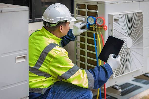Professional Heat Pump Repair technician working in Kittrell, NC
